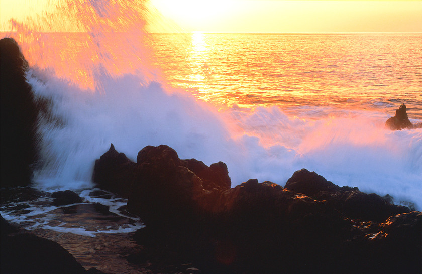 Breaking waves on rocks at sunset-1 
 Breaking waves on rocks with bright yellow sun behind 
 Keywords: Rocks, Sea, Suffolk, Sun, Tony Pick, breakers, breaking, crashing, nautical, power, surf, tide, waves