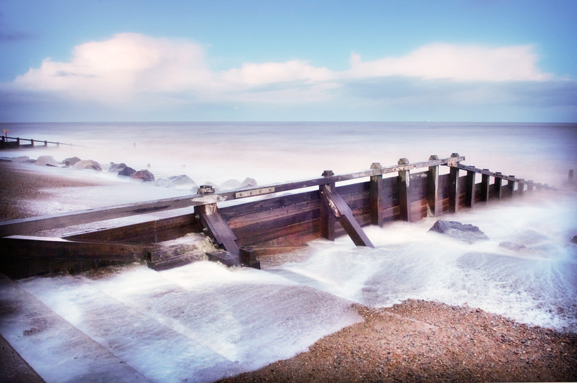 misty sea defence groynes and rocks suffolk-3 
 sea defence groynes in mist 
 Keywords: Beach, Groynes, Mist, Rough, Sea, Suffolk, Tony Pick, agency, breakers, defences, environment, nautical, smoke, tide, waves