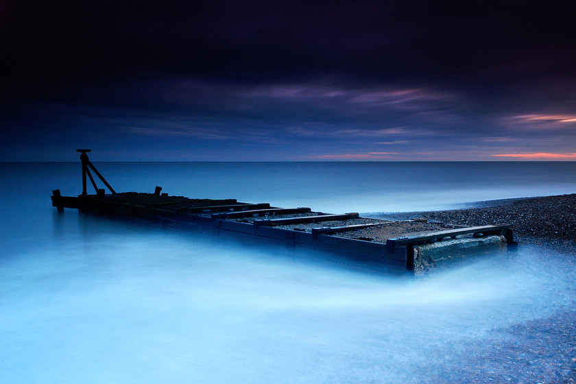 Atmospheric sluice structue in sea-2 
 Sluice structure in sea with mist 
 Keywords: Mist, Sea, Sluice, Suffolk, Tony Pick, atmospheric, blue, movement, nautical, sky, smoke, structure, tide, waves