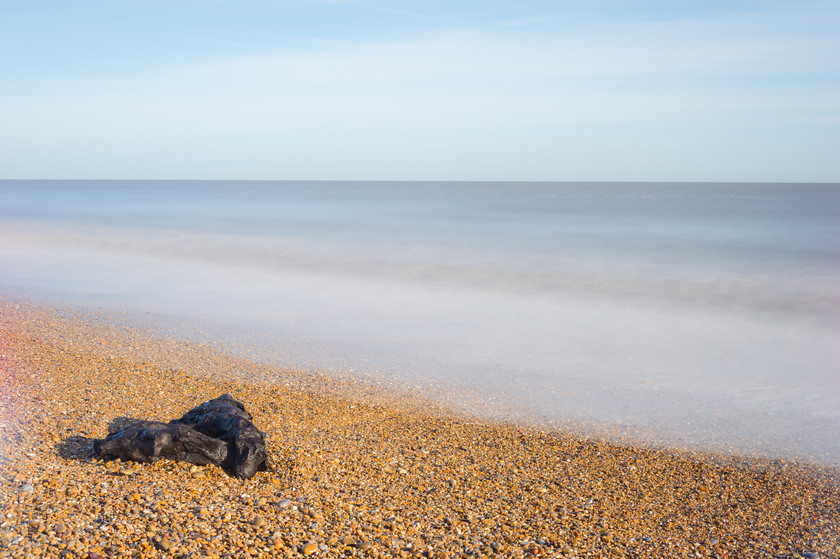 calm sea and beach in mist at Aldeburgh in Suffolk-1 
 Driftwood on misty beach at Aldeburgh in Suffolk 
 Keywords: Aldeburgh, Beach, Mist, Sea, Suffolk, Tony Pick, Wood, calm, drift, nautical, smoke, tide, waves